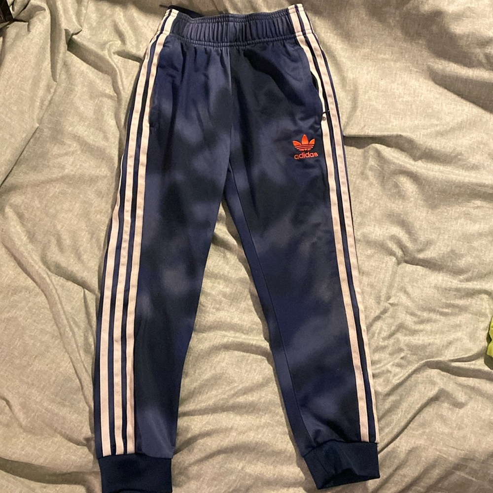 Blue tie dyed adidas joggers
